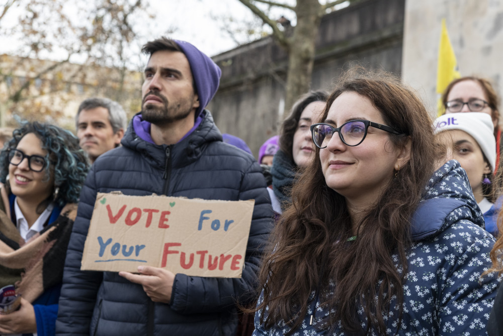 Volt members participate in a demonstration during the Paris GA