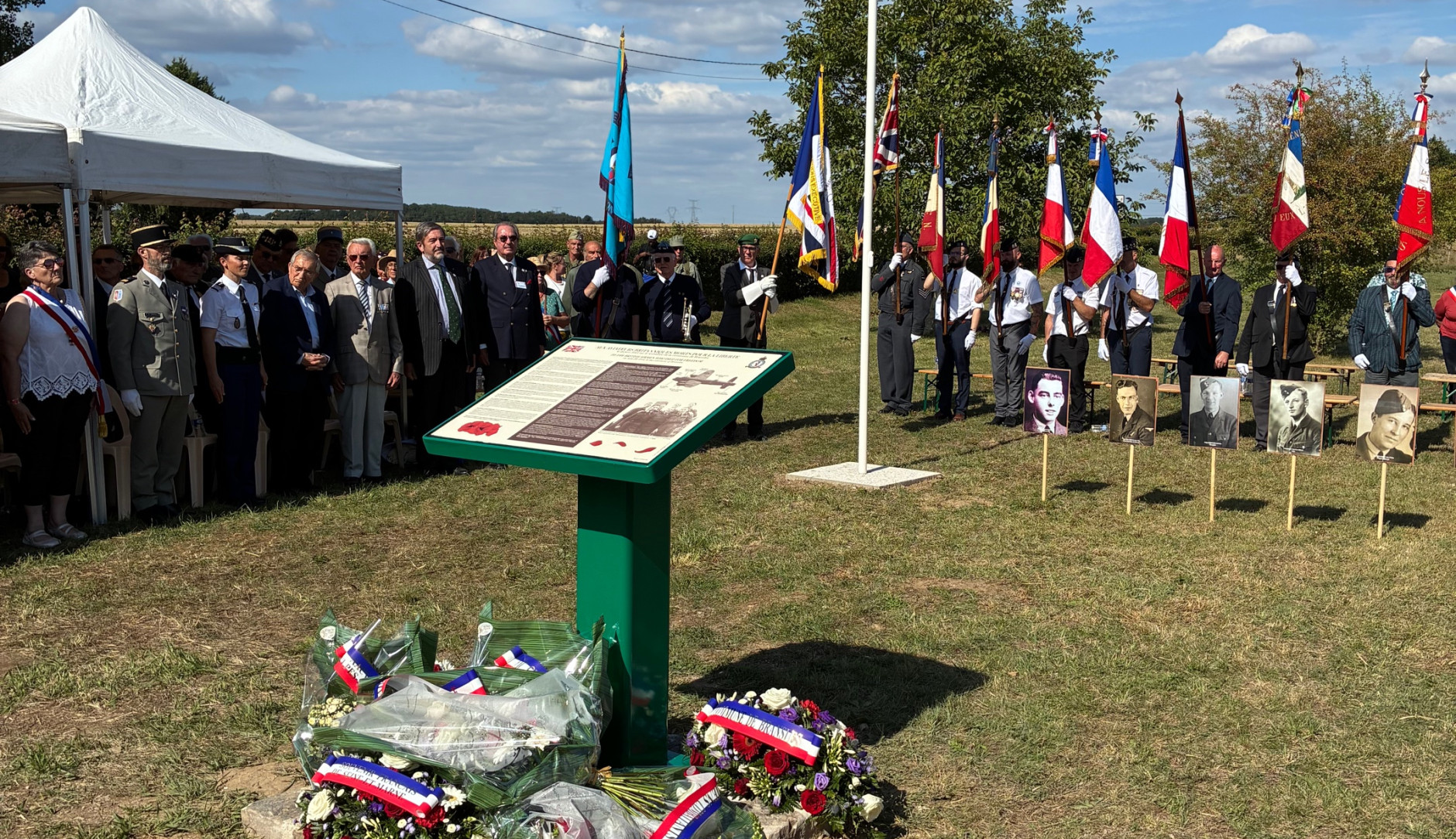People in Bransles, France, conmemorating fallen British soldiers