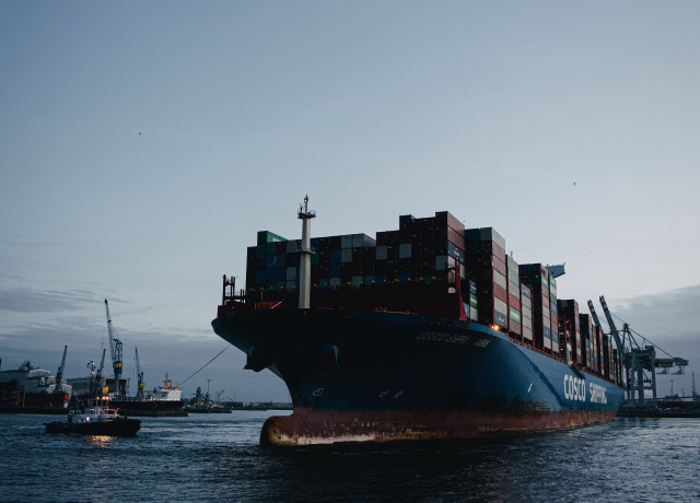 COSCO Shipping boat carrying shipping containers