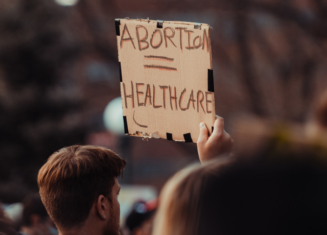 'Abortion = Healthcare' sign at a pro choice march.
