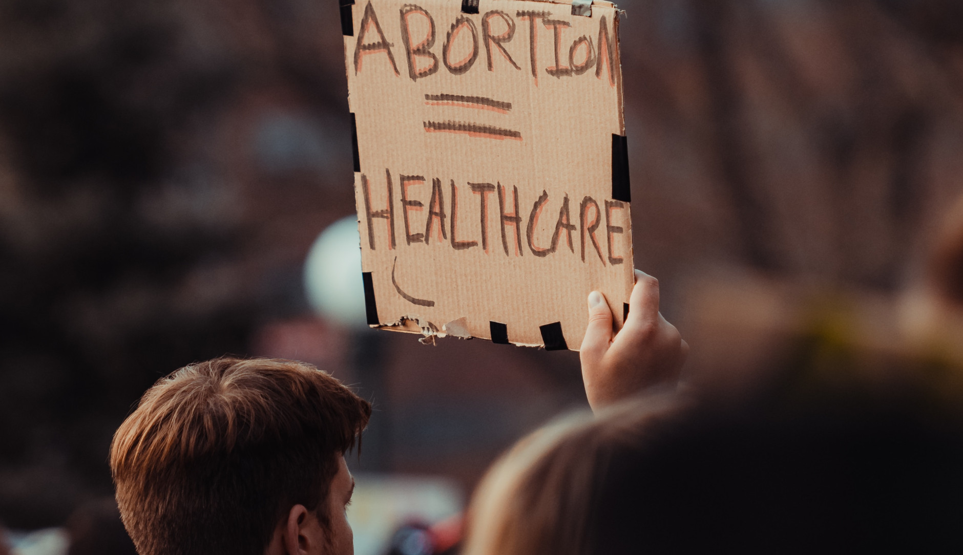 'Abortion = Healthcare' sign at a pro choice march.
