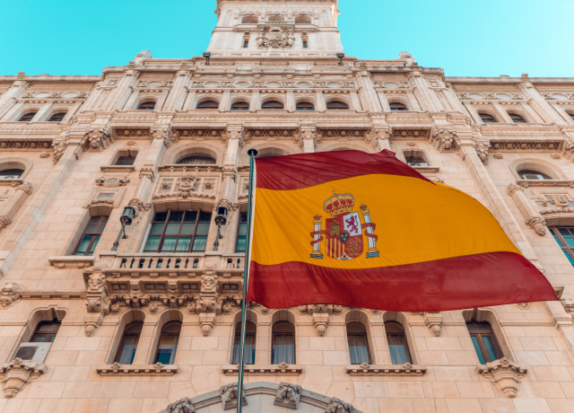 The Spanish flag flying on a building