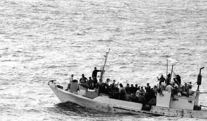 A flimsy boat full of migrants trying to cross the Mediterranean.