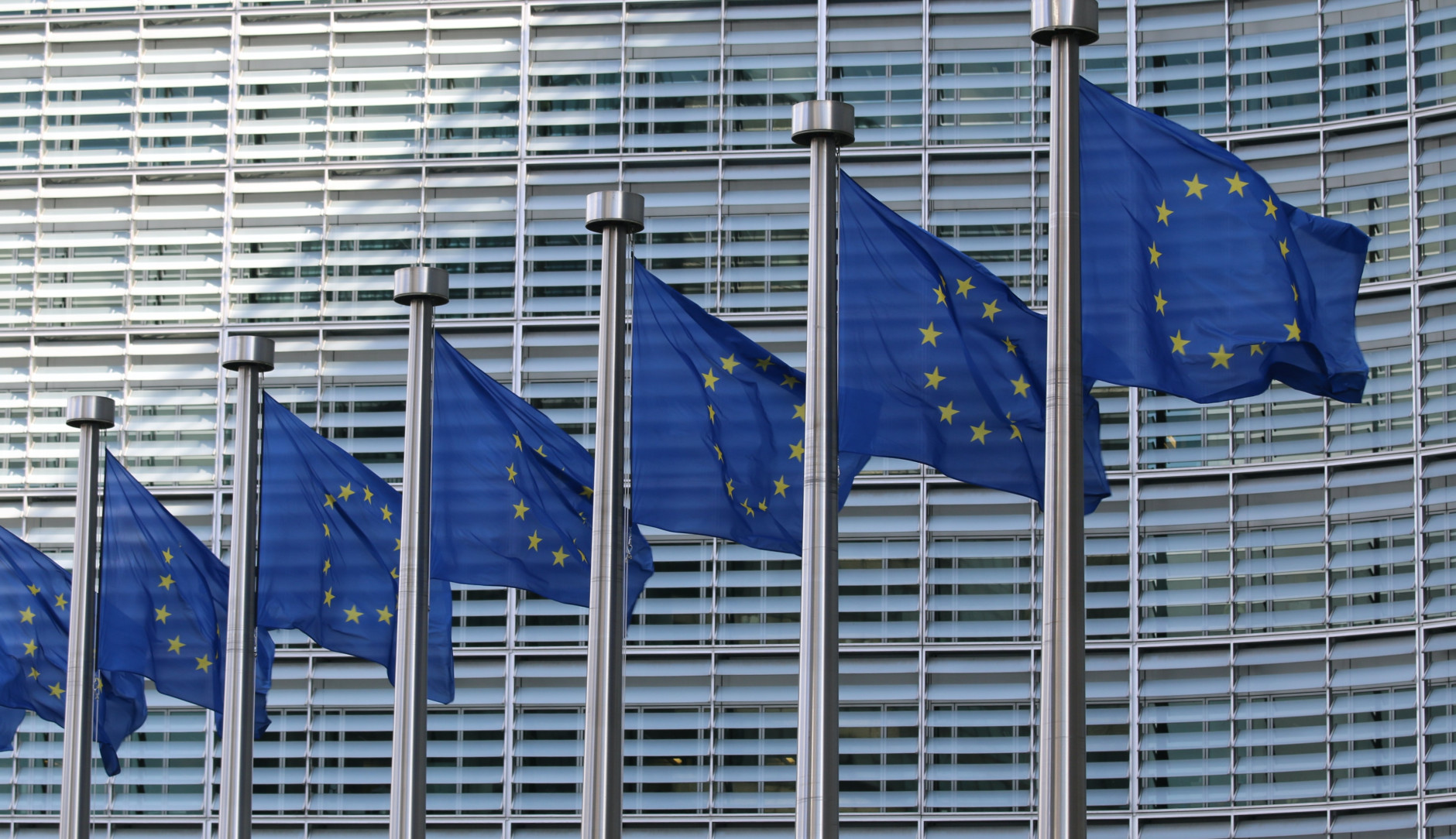 EU flags flying outside the European Commission