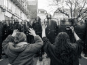 Protestors face riot police