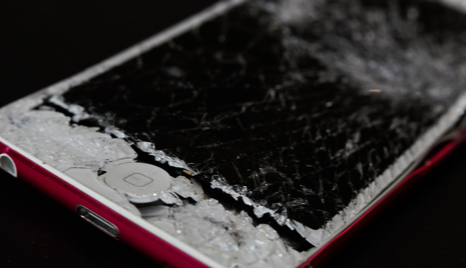 A smartphone with a smashed screen.