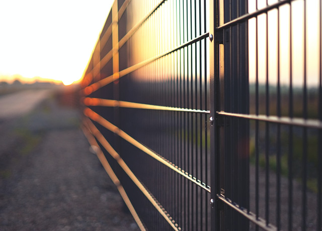 A long metal fence