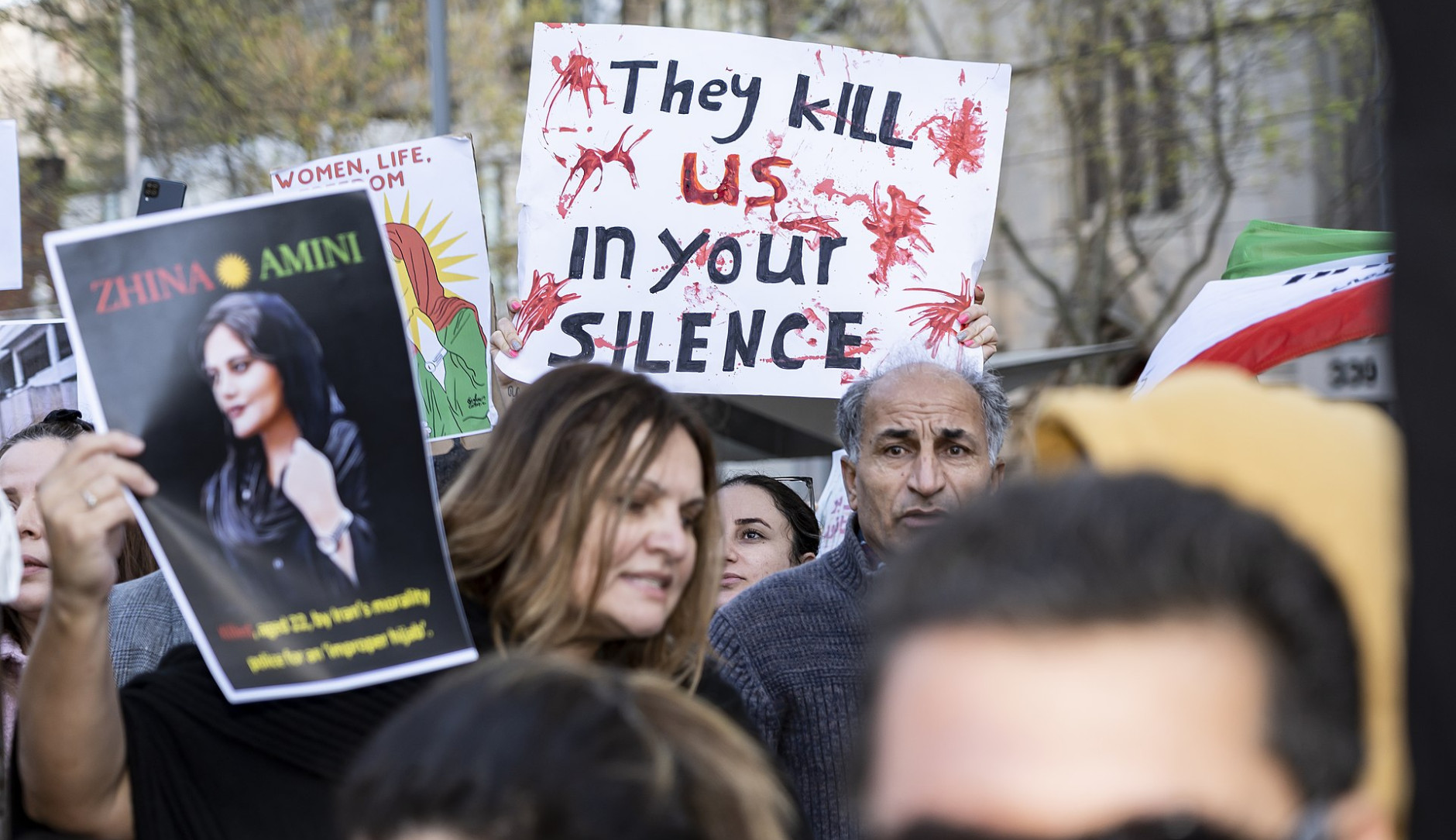 A group of people protesting against the Iranian regime